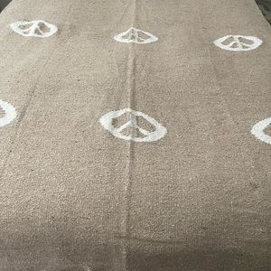 Beautiful beige Peace blanket with ♥️77”approximately by 47” wide!